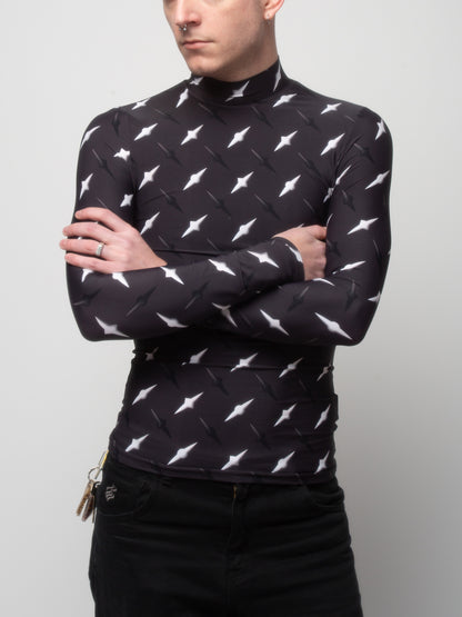 Male model side front view of wearing VinöniV / VinoniV Manhattan fitted bodysuit jersey top featuring New York City abstract cityscape-inspired pattern.