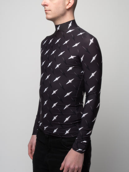 Male model side front view of wearing VinöniV / VinoniV Manhattan fitted bodysuit jersey top featuring New York City abstract cityscape-inspired pattern.